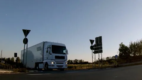 Semi trucks van cargo and parcel delivery driving on a highway. White Van delive Stock Footage 228680310