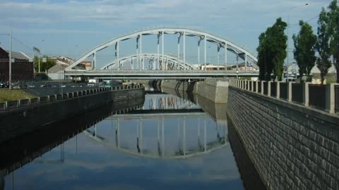 Semicircular bridge across the river Stock Footage 246853880