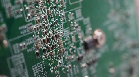 Semiconductor. cpu chip located on the green motherboard of the computer. Stock Photos