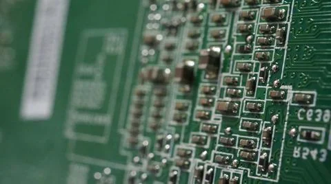 Semiconductor. cpu chip located on the green motherboard of the computer. Stock Photos