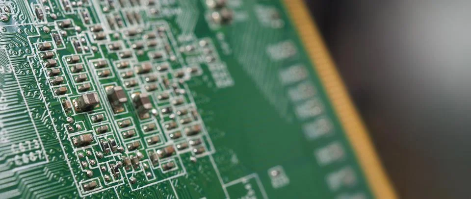 Semiconductor. cpu chip located on the green motherboard of the computer. Stock Photos