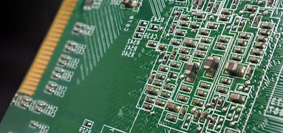 Semiconductor. cpu chip located on the green motherboard of the computer. Stock Photos