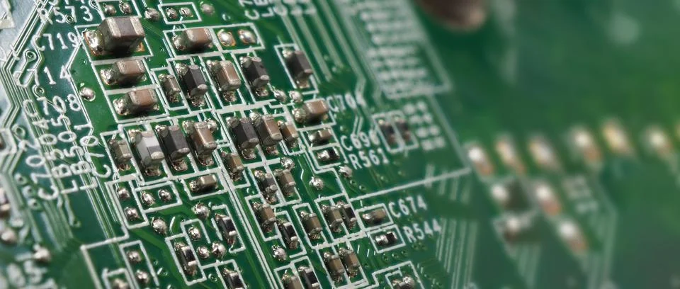 Semiconductor. cpu chip located on the green motherboard of the computer. Stock Photos