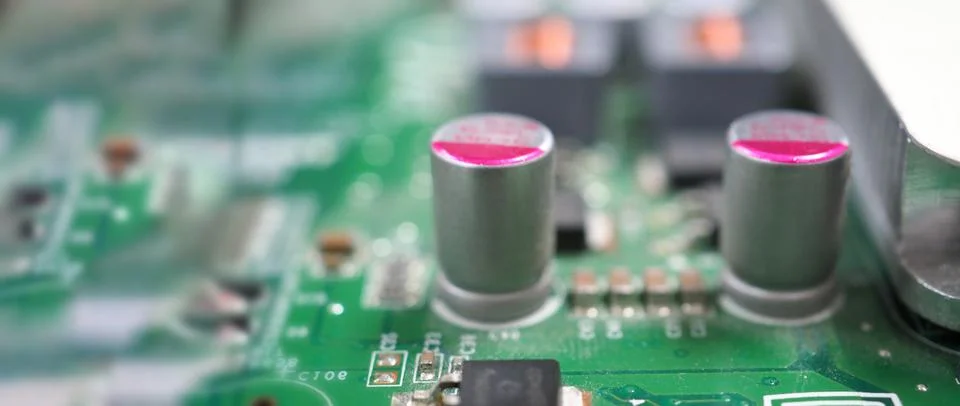 Semiconductor. cpu chip located on the green motherboard of the computer. Stock Photos