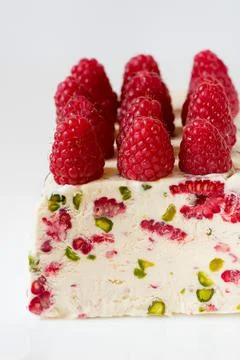 Semifreddo with raspberry and pistachios Stock Photos
