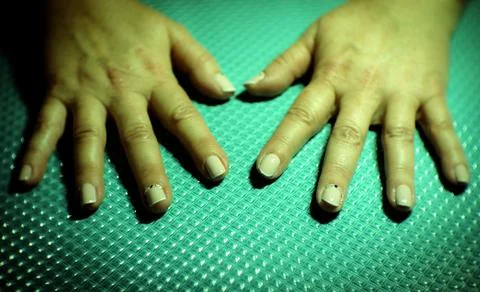 Semipermanent manicure beige Stock Photos