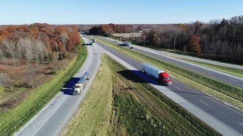 Semis Taking off Ramp from I 70 Stock Footage 98121994