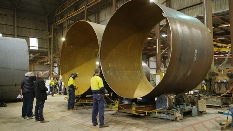 Senator Derryn Hinch visiting wind tower factory in Portland Stock Footage 105498678