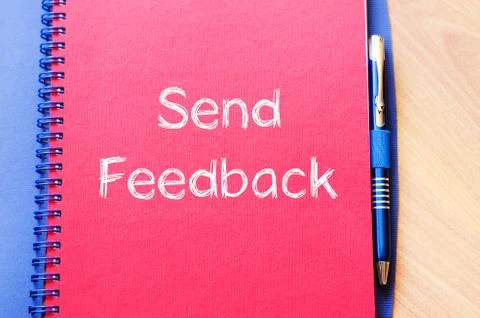 Send feedback concept on notebook Stock Photos