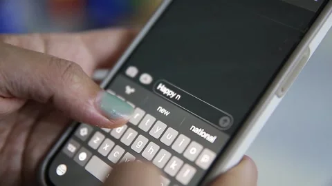 Send a New Year's message on one's smartphone Stock Footage 278800424