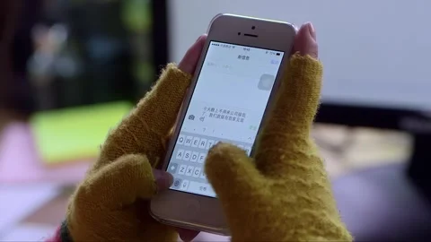 Send a text message using the phone Stock Footage 261642259