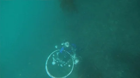 Sending Bubble Rings From Underwater Stock Footage 129250086