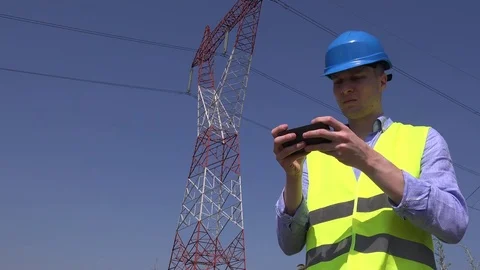 Sending email by mobile phone electricity field engineer supervisor reporting 4K Stock Footage