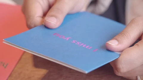 Sending a heartfelt card to express missing someone special Stock Footage 310081015
