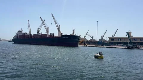 SENEGAL - 7.14.2025 - A large cargo ship is docked in a Senegal harbor. Video stock 316091642