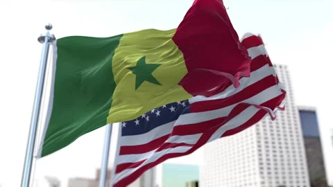 Senegal and United States Flags Waving on Flagpoles. Seamless Stock Footage 297386653