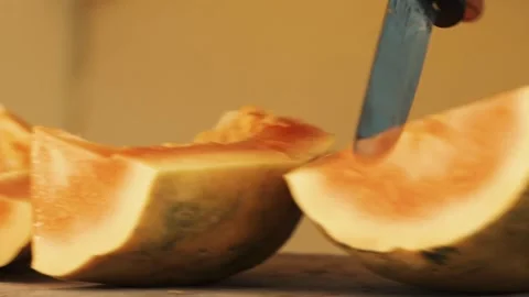 Senegalese Bartender Craft: Macro Close-up of African Hands Slicing Fresh Papaya Stock Footage 309913844