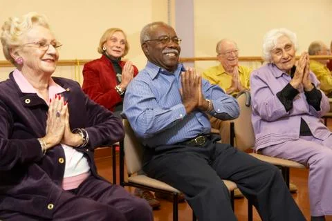 Senior adults in a stretching class Stock Photos