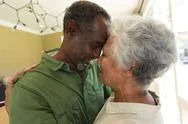 Senior African American Couple Cuddling Stock Photos