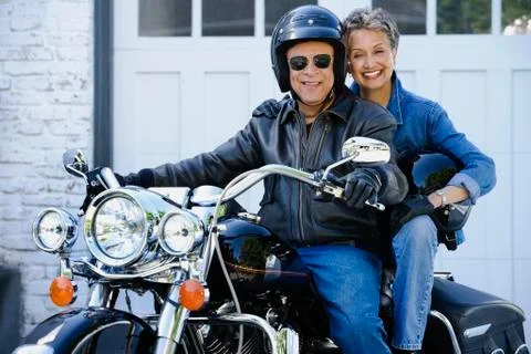 Senior African American couple on motorcycle Stock Photos