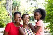 Senior African American Woman Spending Time With Her Daughter And Her Stock Photos