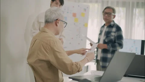 Senior Analyzing Technology Document Workshop Education Collaboration. Stock Footage 308168986
