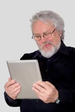 Senior and tablet pc Stock Photos
