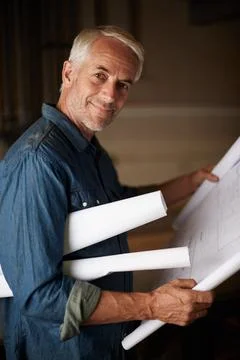 Senior architect, blueprint and man with drawing, renovation or remodeling Stock Photos