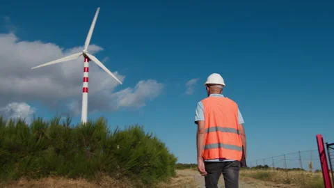 Senior Architect checks the correct functioning of wind turbines Video stock 272273133