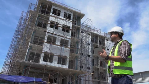Senior architect or civil engineer using tablet computer inspection at cons.. Stock Footage 262154168