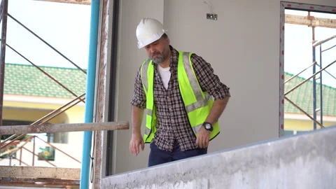 Senior architect or civil engineer control worker and inspection at constru.. Stock Footage 262154355