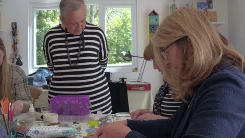 Senior artists working in studio Stock Footage 76901565