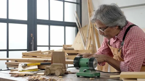 Senior Asian carpenter working Stock Footage 169299095