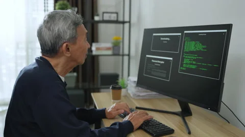 Senior asian man coding and programming on screen desktop. Stock Footage 207129582
