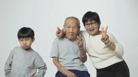 Senior Asian man doing a video call via mobile phone with family. Stock Footage 155678526