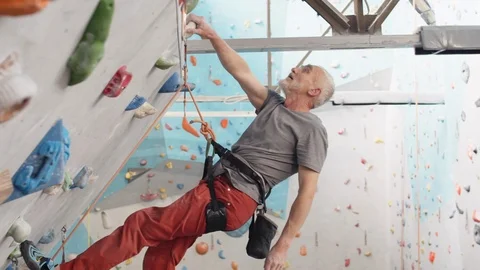Senior Athletic Climber Having Practice Stock Footage 119029051