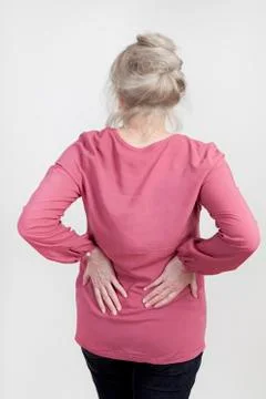Senior with back pain Photos