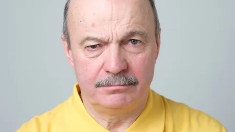 Senior bald man showing refusal gesture, shaking his head Stock Footage 102806465