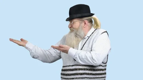 Senior bearded man showing copy space with hands. Stock Footage 145207640