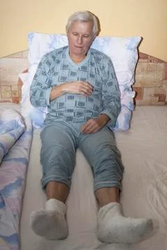 Senior in bed Stock Photos