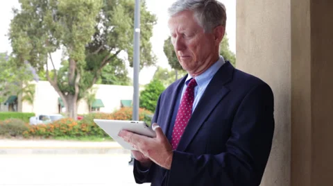 Senior Business Man with Tablet Computer Medium Shot Stock Footage 32233732