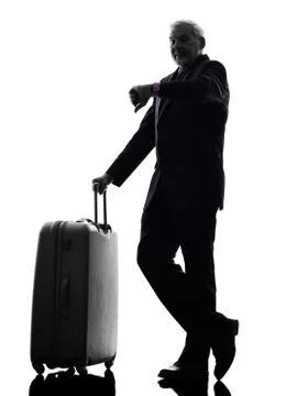 Senior business man traveler traveling waiting silhouette Stock Photos