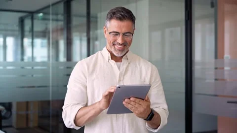 Senior businessman using digital finance tools