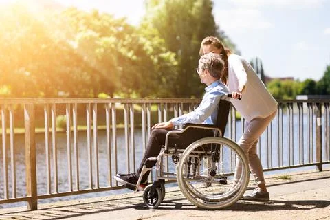 Senior Care And Wheelchair Transport Stock Photos