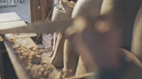 Senior carpenter checking sanded plank in his workshop Vídeos de archivo 58152856
