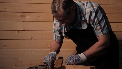 Senior carpenter preparing to work Stock Footage 77214228