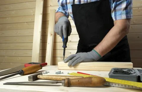 Senior carpenter working in his workshop Stock Photos