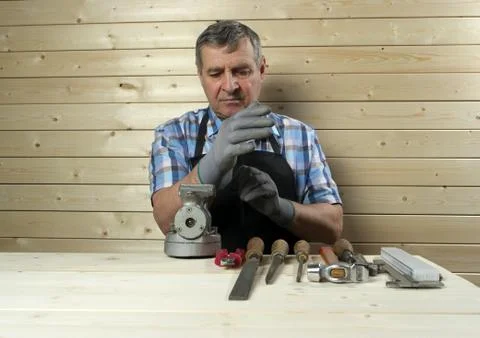 Senior carpenter working in his workshop Stock Photos
