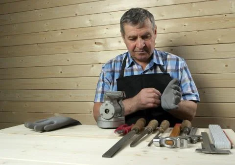 Senior carpenter working in his workshop Stock Photos