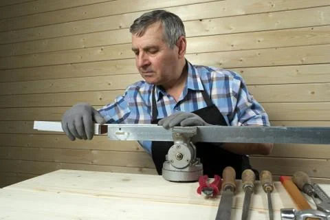 Senior carpenter working in his workshop Stock Photos